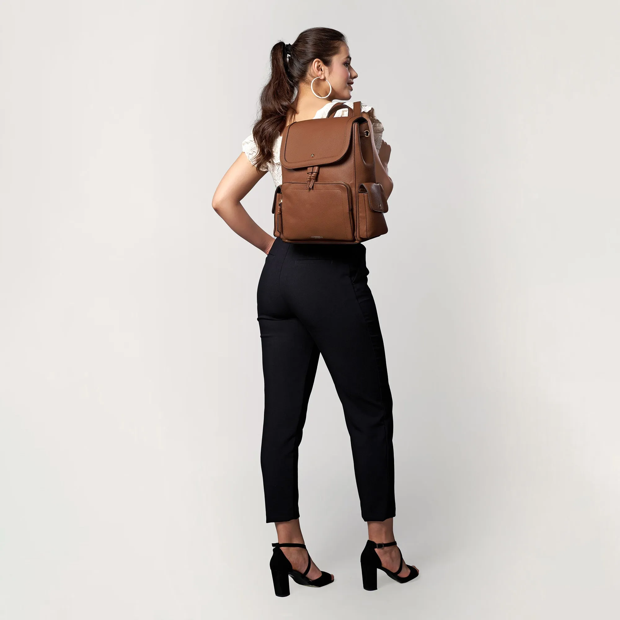 Brown Faux Leather Laptop Backpack With 12 Laptop Sleeve